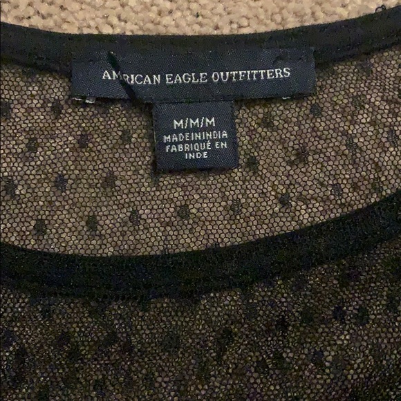 Black long sleeved see thru too with red flowers - Picture 3 of 5